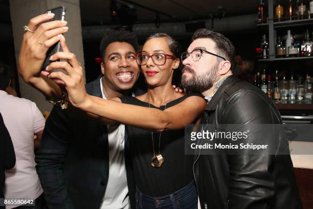 Saeed Jones, Isaac Fitzgerald and guest attend the BuzzFeed AM to DM launch party on October 23, 2017 in New York City.