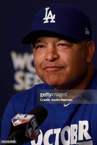 Manager Dave Roberts of the Los Angeles Dodgers answers questions from the media ahead of the World Series at Dodger Stadium on October 23, 2017 in...