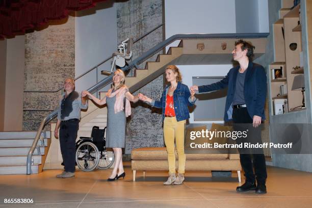 Actors Francois Berleand, Evelyne Buyle, Elise Diamant and Eric Elmosnino acknowledge the applause of the audience at the end of the "Ramses II"...