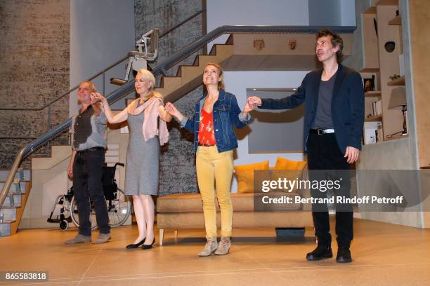 Actors Francois Berleand, Evelyne Buyle, Elise Diamant and Eric Elmosnino acknowledge the applause of the audience at the end of the "Ramses II"...