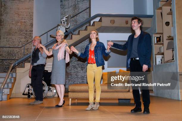 Actors Francois Berleand, Evelyne Buyle, Elise Diamant and Eric Elmosnino acknowledge the applause of the audience at the end of the "Ramses II"...