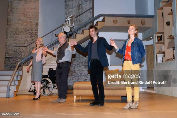 Actors Evelyne Buyle, Francois Berleand, Eric Elmosnino and Elise Diamant acknowledge the applause of the audience at the end of the "Ramses II"...