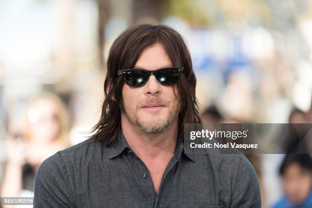 Norman Reedus visits "Extra" at Universal Studios Hollywood on October 23, 2017 in Universal City, California.