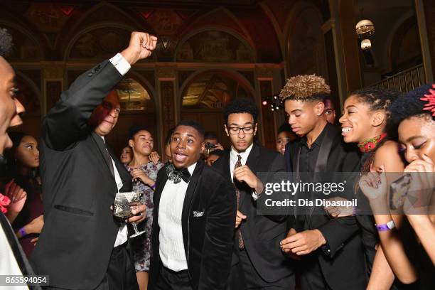 President Eric Pryon dances with students at HSA Masquerade Ball on October 23, 2017 at The Plaza Hotel in New York City.