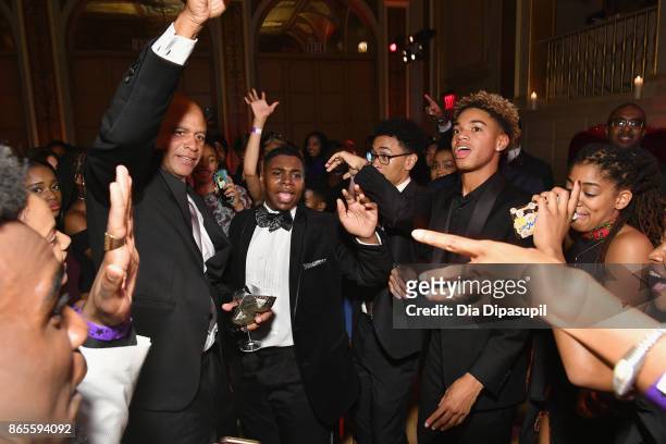 President Eric Pryon dances with students at HSA Masquerade Ball on October 23, 2017 at The Plaza Hotel in New York City.