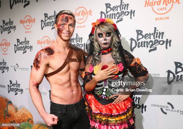 Julian David and Annemarie Eilfeld attend the Halloween party hosted by Natascha Ochsenknecht at Berlin Dungeon on October 23, 2017 in Berlin,...