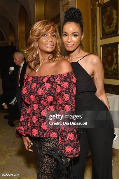 Vivian Scott Chew and guest attend HSA Masquerade Ball on October 23, 2017 at The Plaza Hotel in New York City.