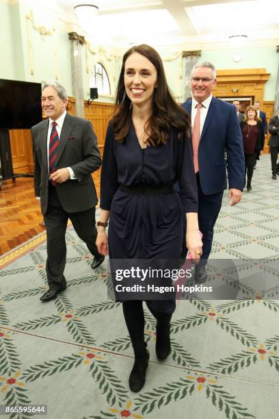 Prime Minister-designate Jacinda Ardern and NZ First leader Winston Peters leave a coalition agreement signing at Parliament on October 24, 2017 in...