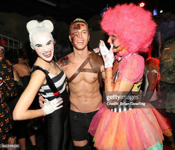 Anna Hofbauer, Julian David, and Natascha Ochsenknecht attend the Halloween party hosted by Natascha Ochsenknecht at Berlin Dungeon on October 23,...