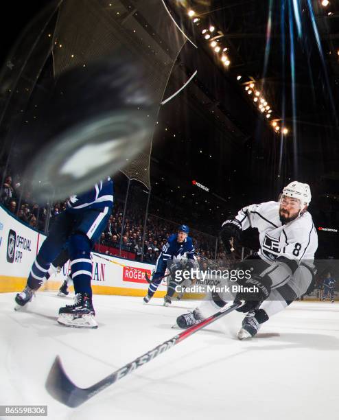 Drew Doughty of the Los Angeles Kings chases the puck during the third period against the Toronto Maple Leafsat the Air Canada Centre on October 23,...