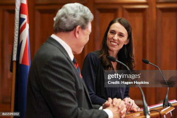 Prime Minister-designate Jacinda Ardern and NZ First leader Winston Peters speak to media during a coalition agreement signing at Parliament on...