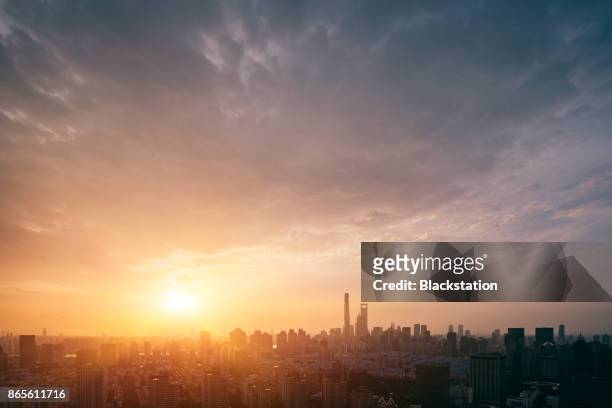 with the sunshine and clouds above the horizon - sunset stock pictures, royalty-free photos & images