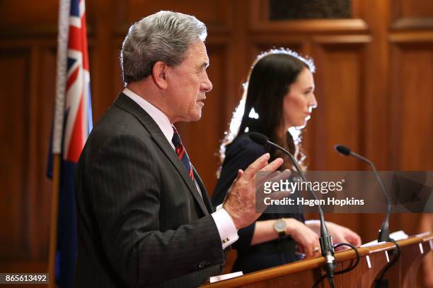 Prime Minister-designate Jacinda Ardern and NZ First leader Winston Peters speak to media during a coalition agreement signing at Parliament on...