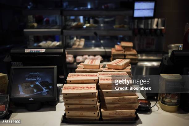 Portions of 'Jolly Spaghetti' sit in containers on the counter of a Jollibee Foods Corp. Restaurant in the Bonifacio Global City triangle area of...