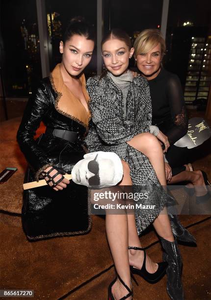 Bella Hadid, Gigi Hadid and Yolanda Hadid attend V Magazine's intimate dinner in honor of Karl Lagerfeld at The Top of The Standard on October 23,...