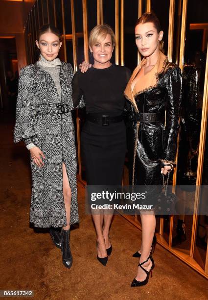 Gigi Hadid, Yolanda Hadid and Bella Hadid attend V Magazine's intimate dinner in honor of Karl Lagerfeld at The Top of The Standard on October 23,...