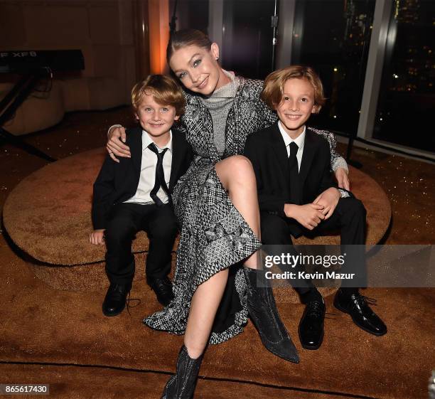 Jameson Kroenig, Gigi Hadid and Hudson Kroenig attend V Magazine's intimate dinner in honor of Karl Lagerfeld at The Top of The Standard on October...