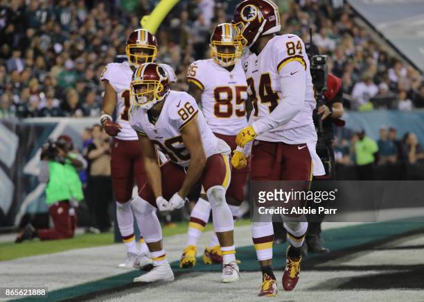 Jordan Reed of the Washington Redskins celebrates his touchdown with teammates against the Philadelphia Eagles in the third quarter of the game at...