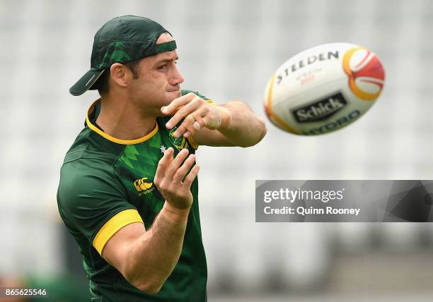 Cooper Cronk of Australia passes the ball during an Australian Kangaroos training session at Lakeside Stadium on October 24, 2017 in Melbourne,...