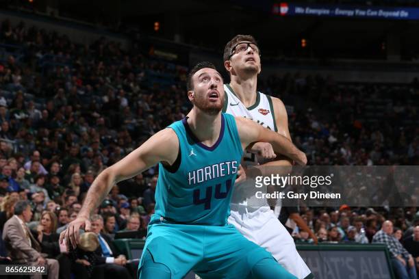 Frank Kaminsky of the Charlotte Hornets plays defense against Mirza Teletovic of the Milwaukee Bucks on October 23, 2017 at the BMO Harris Bradley...