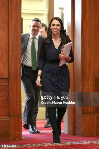 Prime Minister-designate Jacinda Ardern and Green Party leader James Shaw arrive at a confidence and supply agreement signing at Parliament on...