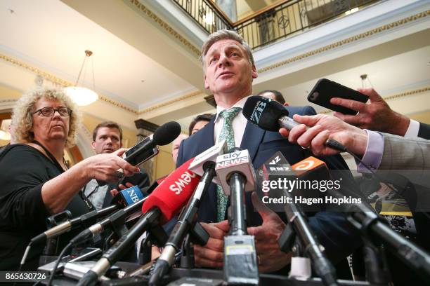 National Party leader Bill English speaks to media during a post caucus press conference at Parliament on October 24, 2017 in Wellington, New...