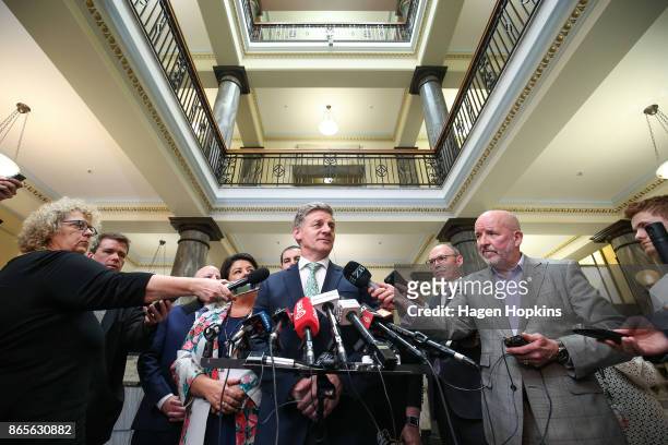 National Party leader Bill English speaks to media during a post caucus press conference at Parliament on October 24, 2017 in Wellington, New...