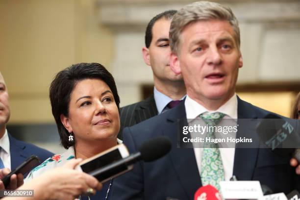 National Party deputy leader Paula Bennett looks on as leader Bill English speaks to media during a post caucus press conference at Parliament on...