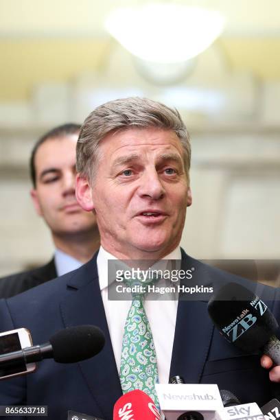 National Party leader Bill English speaks to media during a post caucus press conference at Parliament on October 24, 2017 in Wellington, New...