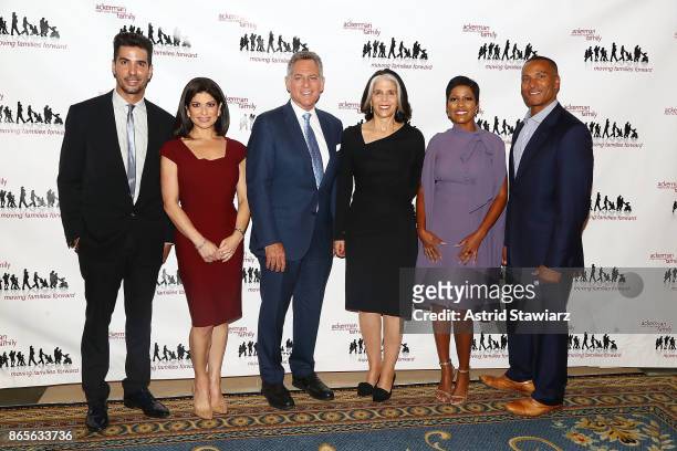 Javier Gomez, Tamsen Fadal, Bill Ritter, Lois Braverman, Tamron Hall and Mike Woods attend the 11th annual Moving Families Forward gala held at JW...