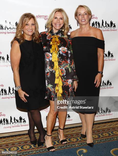 Deborah Werner, Nina Taselaar and Martha Fling attend the 11th annual Moving Families Forward gala at JW Marriot Essex House on October 23, 2017 in...