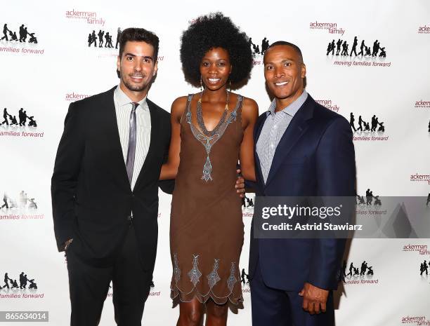 Javier Gomez,Camilla Barungi and Mike Woods attend the 11th annual Moving Families Forward gala held at JW Marriot Essex House on October 23, 2017 in...