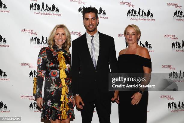 Nina Taselaar, Javier Gomez and Martha Fling attend the 11th annual Moving Families Forward gala at JW Marriot Essex House on October 23, 2017 in New...