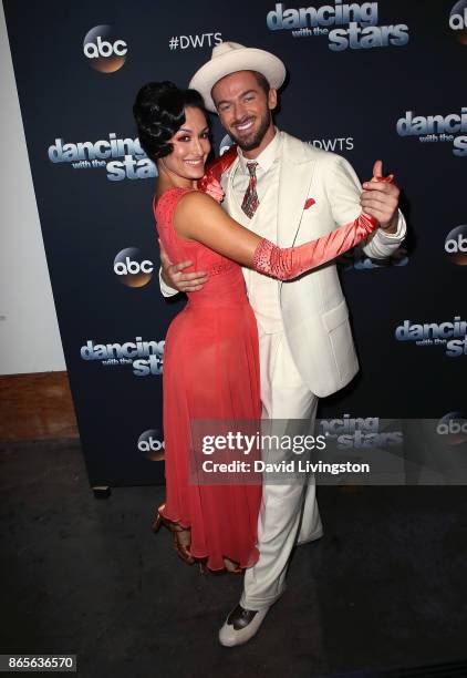 Professional wrestler Nikki Bella and dancer Artem Chigvintsev pose at "Dancing with the Stars" season 25 at CBS Televison City on October 23, 2017...