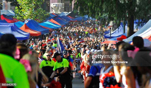 Mississippi Rebels players greet fans as they walk down the Walk of Champions in the Grove on the Ole Miss Campus before the start of a college...