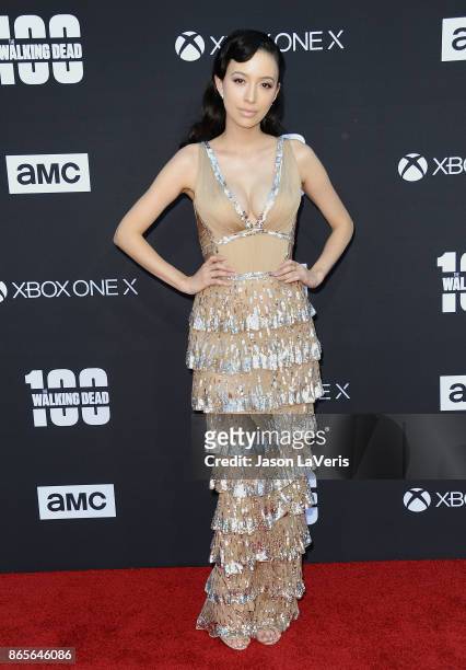 Actress Christian Serratos attends the 100th episode celebration off "The Walking Dead" at The Greek Theatre on October 22, 2017 in Los Angeles,...