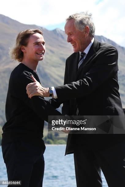 Chef de Mission of the New Zealand Winter Olympic team Peter Wardell congratulates Finn Bilous as his name is announced during the Winter Olympic...