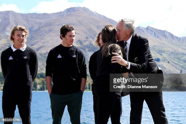 Chef de Mission of the New Zealand Winter Olympic team Peter Wardell congratulates Janina Kumza as her name is announced during the Winter Olympic...