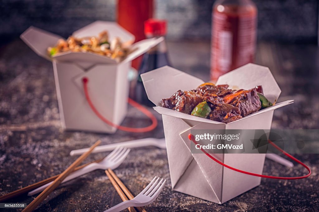 Szechuan beef Served with Rice as Take Out Food