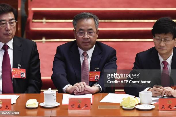 Hu Chunhua, secretary of Guangdong Provincial Party Committee and member of the Political Bureau, attends the closing of the 19th Communist Party...