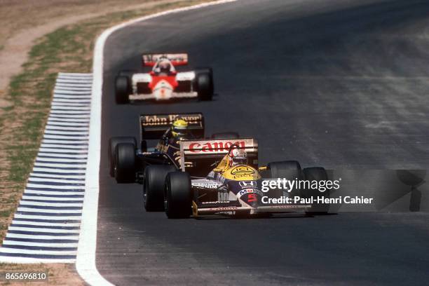 Nigel Mansell, Ayrton Senna, Alain Prost, Williams-Honda FW11, Lotus-Renault 98T, McLaren MP4/2C, Grand Prix of Spain, Circuito de Jerez, 13 April...