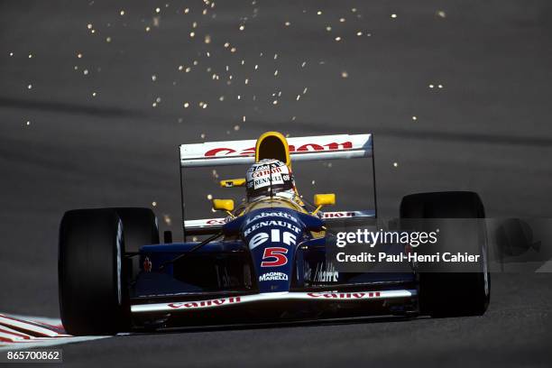 Nigel Mansell, Williams-Renault FW14B, Grand Prix of Belgium, Circuit de Spa-Francorchamps, 30 August 1992. Sparks flying as Nigel Mansell's...