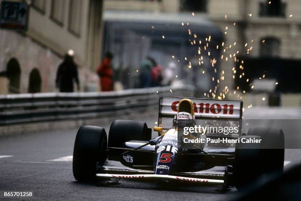 Nigel Mansell, Williams-Renault FW14B, Grand Prix of Monaco, Circuit de Monaco, 31 May 1992. Sparks flying as Nigell Mansell exits Casino square and...