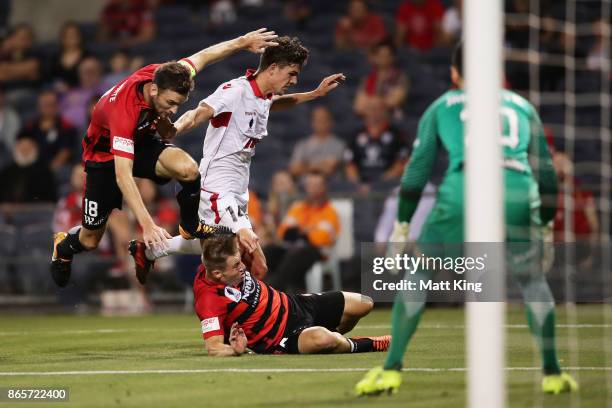 Robbie Cornthwaite and Jacob Melling of the Wanderers defend on George Blackwood of United during the FFA Cup Semi Final match between the Western...