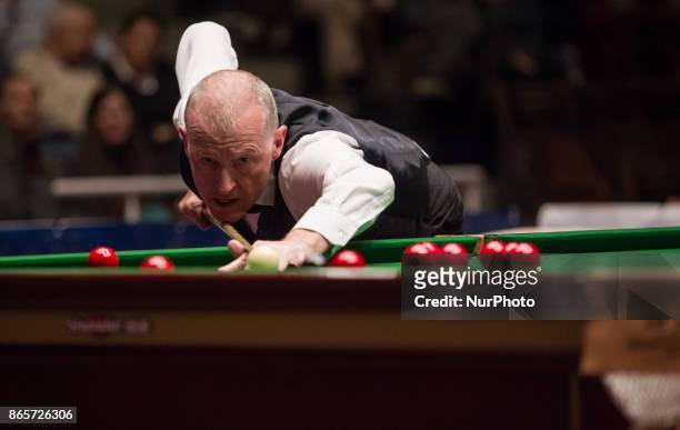 Steve Davis of Great Brittain plays a shot against Mark J. Williams of Wales during the II. Snooker gala on October 23, 2017 in Budapest, Hungary.