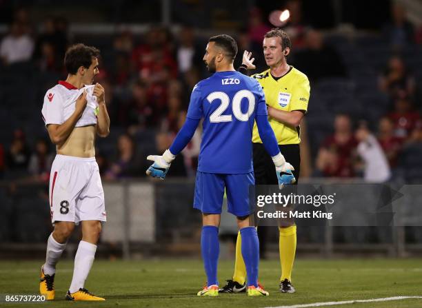 Isaias and United goalkeeper Paul Izzo argue with referee Peter Green after he awarded a penalty to the Wanderers during the FFA Cup Semi Final match...