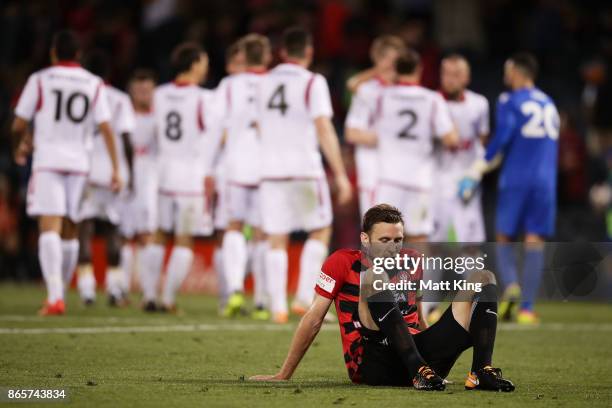 Robbie Cornthwaite of the Wanderers looks dejected after the FFA Cup Semi Final match between the Western Sydney Wanderers and Adelaide United at...