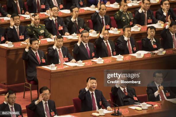 Zhang Dejiang, chairman of the Standing Committee of the National People's Congress, front row from left, Hu Jintao, China's former president, Xi...