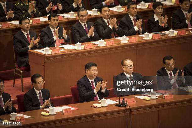 Zhang Dejiang, chairman of the Standing Committee of the National People's Congress, front row from left, Hu Jintao, China's former president, Xi...