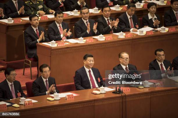 Zhang Dejiang, chairman of the Standing Committee of the National People's Congress, front row from left, Hu Jintao, China's former president, Xi...